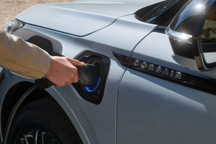 A person charging their 2026 Lincoln Corsair Grand Touring