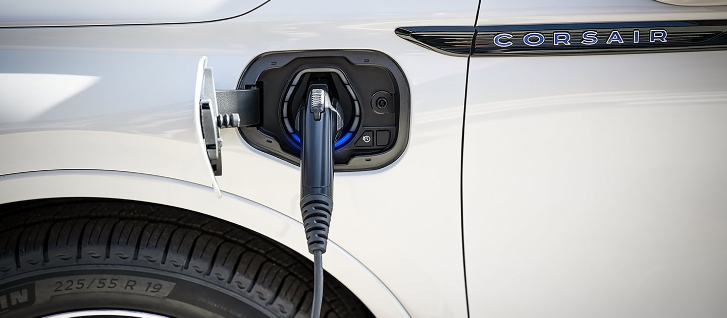 A 2026 Lincoln Corsair® Grand Touring SUV is being charged with a Lincoln Mobile Charging Cord