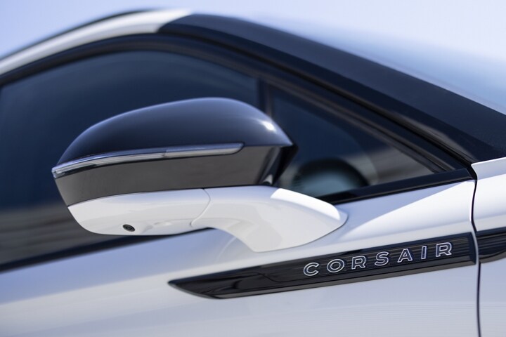 The Autofold sideview mirror of a 2026 Lincoln Corsair® Grand Touring model is shown in its extended position