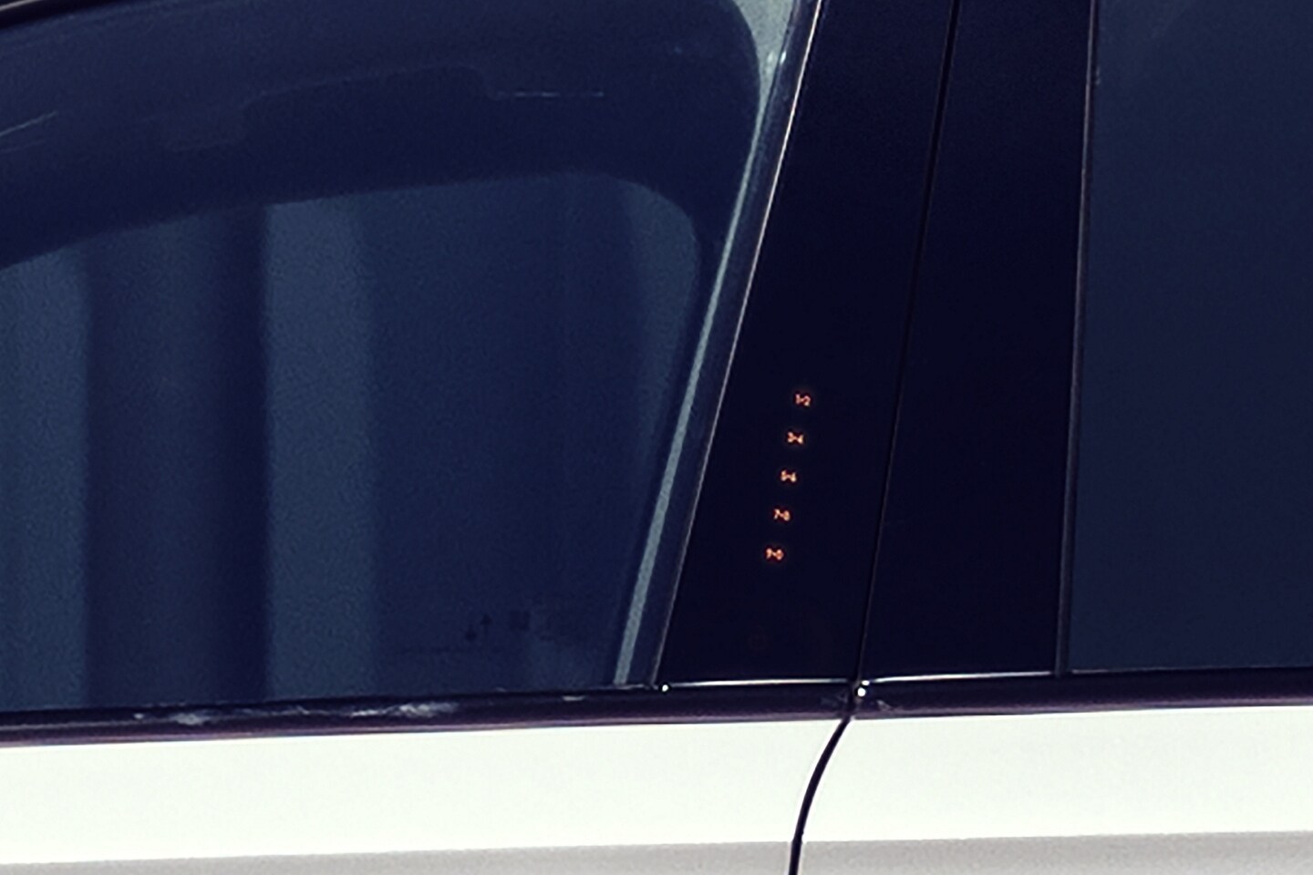 The SecuriCode® Keyless entry pad numbers are illuminated on the outside of the driver's door on a 2026 Lincoln Corsair® SUV