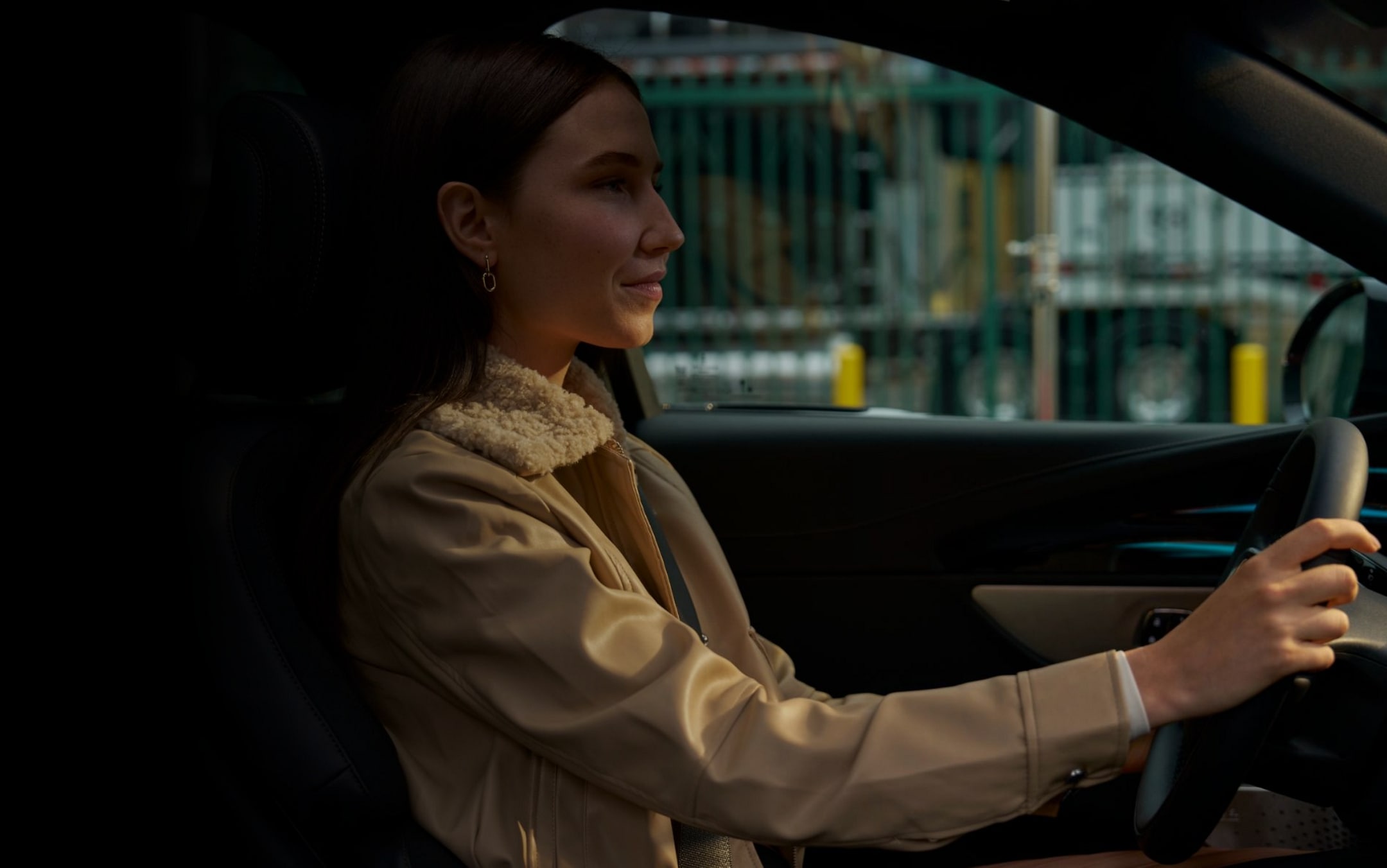 A woman is shown driving the 2024 Lincoln Nautilus