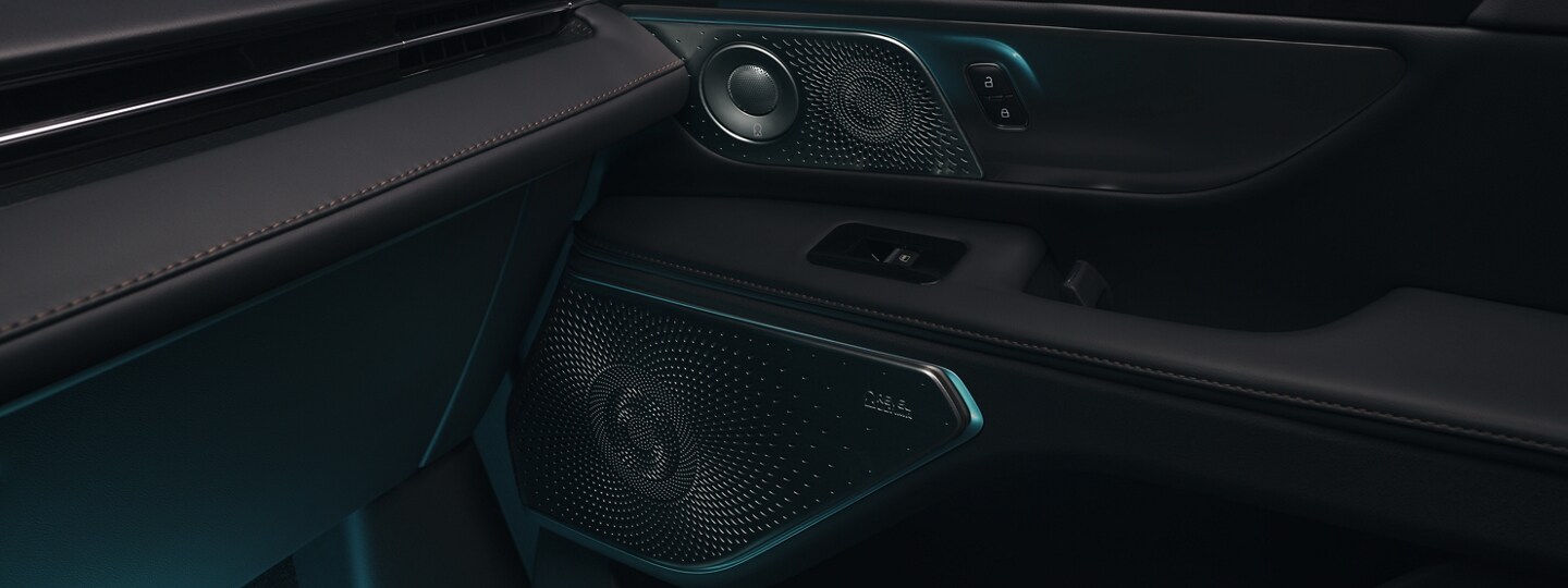 The dashboard and front passenger door panel highlight impressive design lines