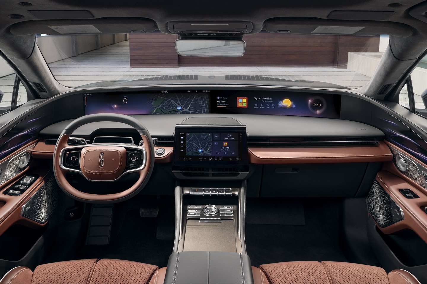 The interior of a 2024 Lincoln Black Label Nautilus® SUV is shown with the calming Redwood interior theme