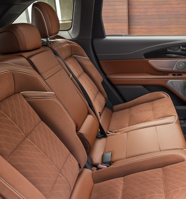 A spacious side view of the second row in a 2024 Lincoln Nautilus® SUV