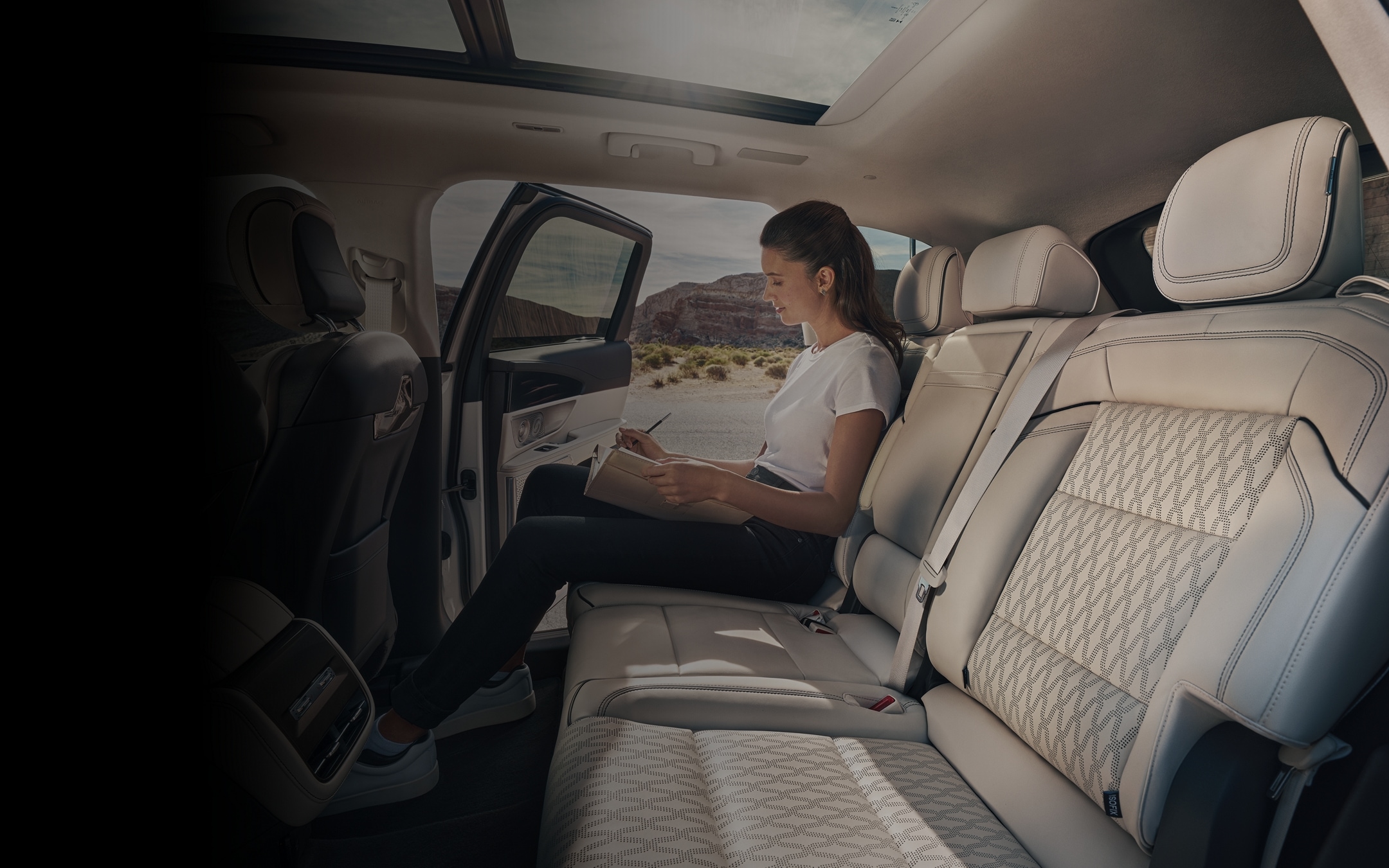 The second row of a 2024 Lincoln Black Label Nautilus® SUV offers ample legroom.
