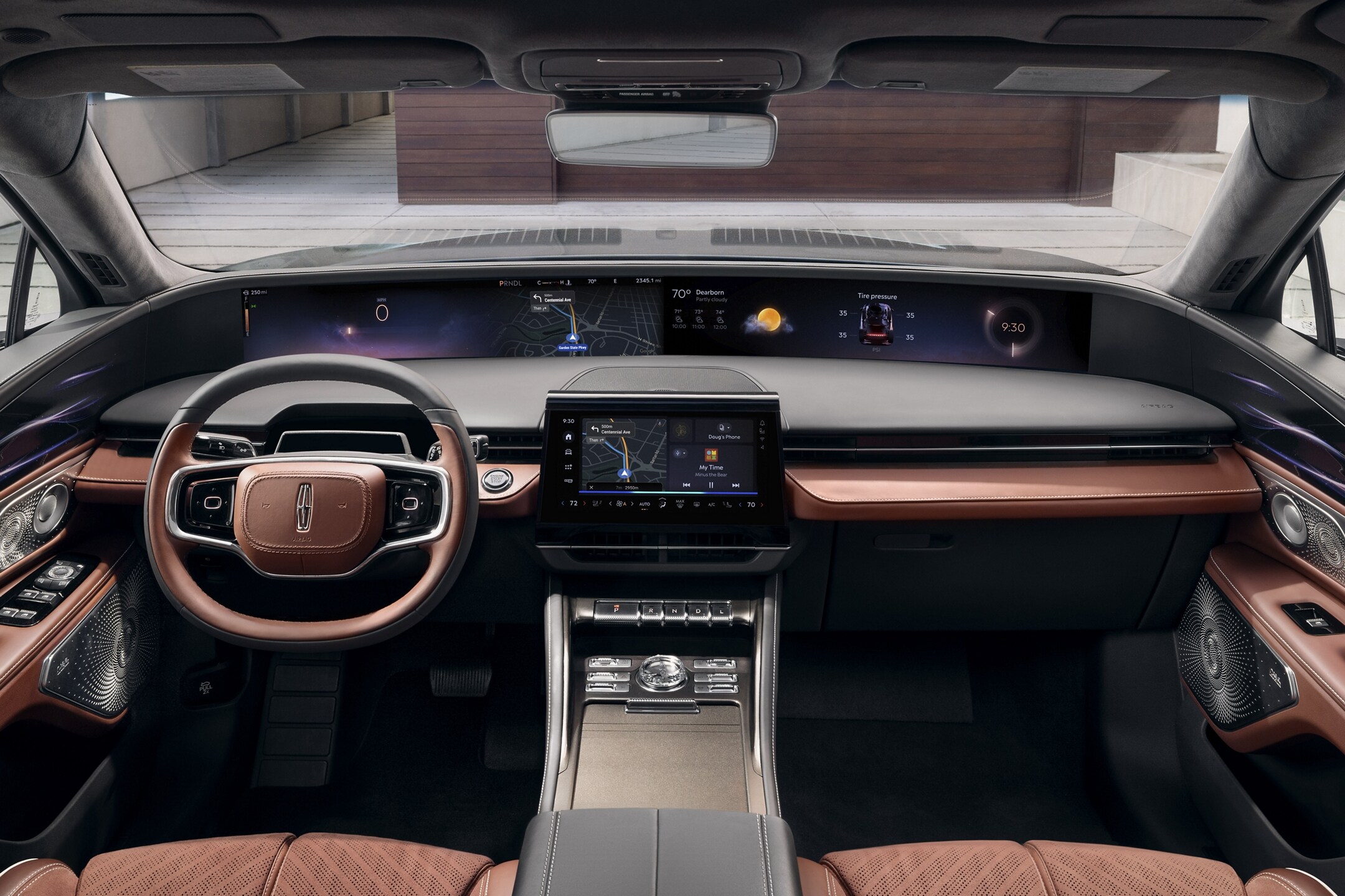 The interior of a 2024 Lincoln Black Label Nautilus® SUV is shown in the Redwood interior theme