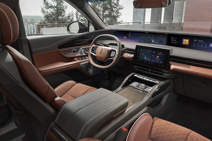 The spacious cabin of a 2025 Lincoln Black Label Nautilus® SUV is shown in the Redwood theme