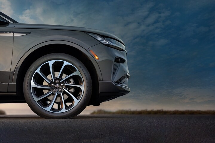 Stylish 10-spoke wheels are shown on a 2025 Lincoln Black Label Nautilus® SUV