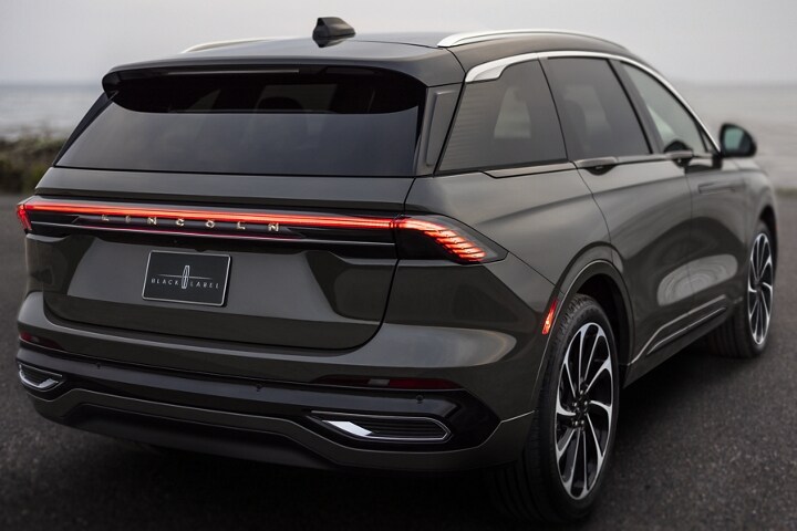A 2025 Lincoln Black Label Nautilus® SUV is parked on an oceanside overlook