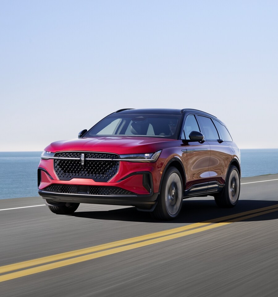 An all-new 2024 Lincoln Nautilus® SUV is being driven in a desert-like setting