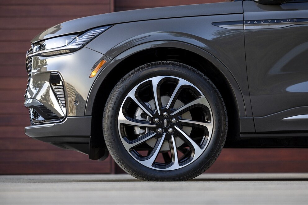 The 22-inch wheels of a 2025 Lincoln Black Label Nautilus® SUV offer sleek style
