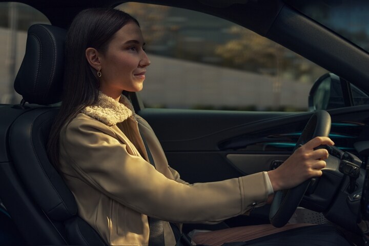 A woman is driving a 2026 Lincoln Nautilus® SUV