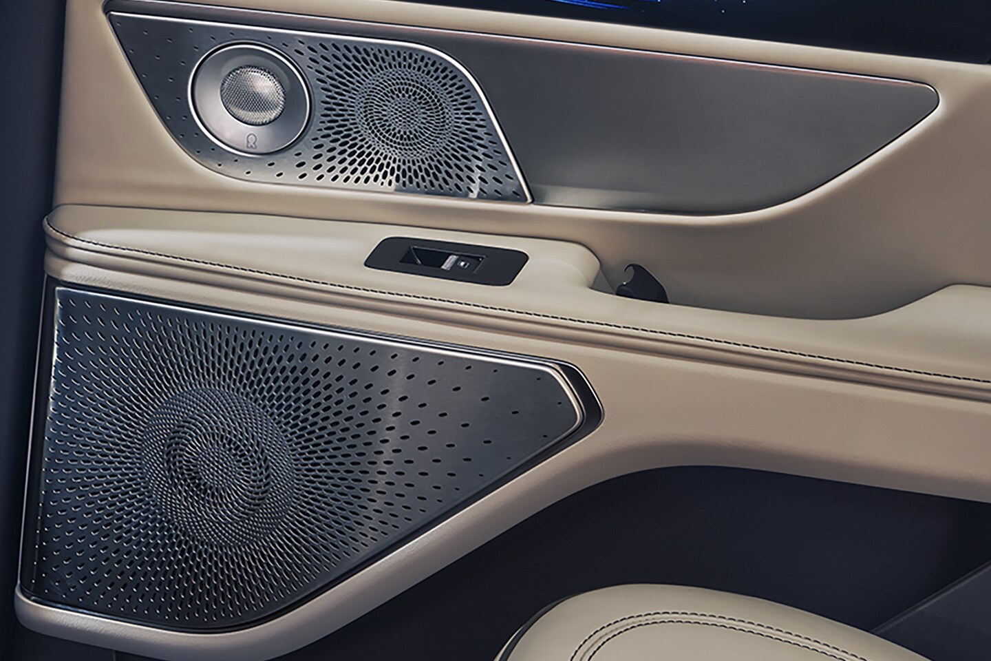 An arrangement of Audio system speakers positioned in the driver's door of a 2026 Lincoln Nautilus® SUV