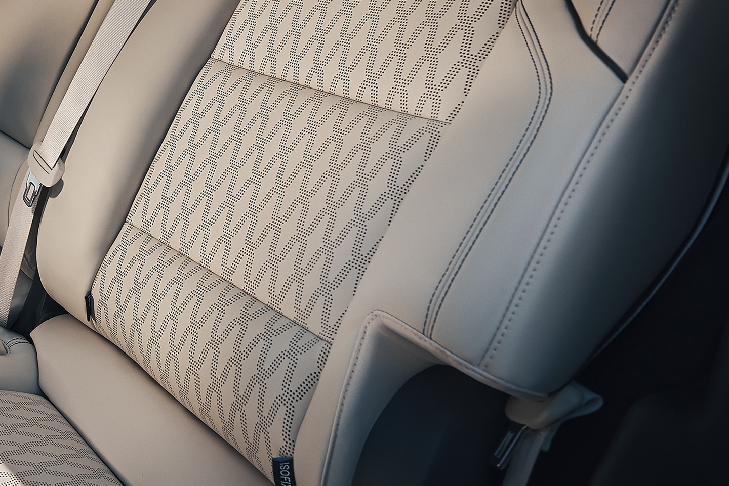 A woman sits in the second row of a 2026 Lincoln Black Label™ Nautilus® SUV with the Chalet theme