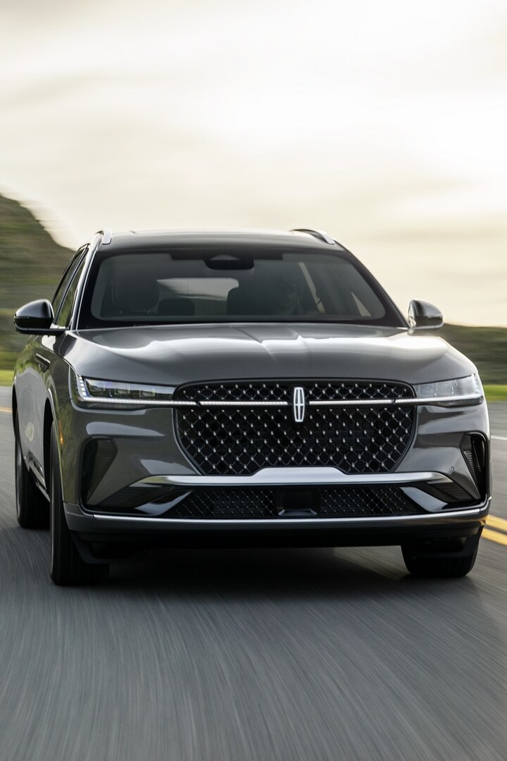 A 2026 Lincoln Black Label™ Nautilus® SUV is being driven on a coastal roadway