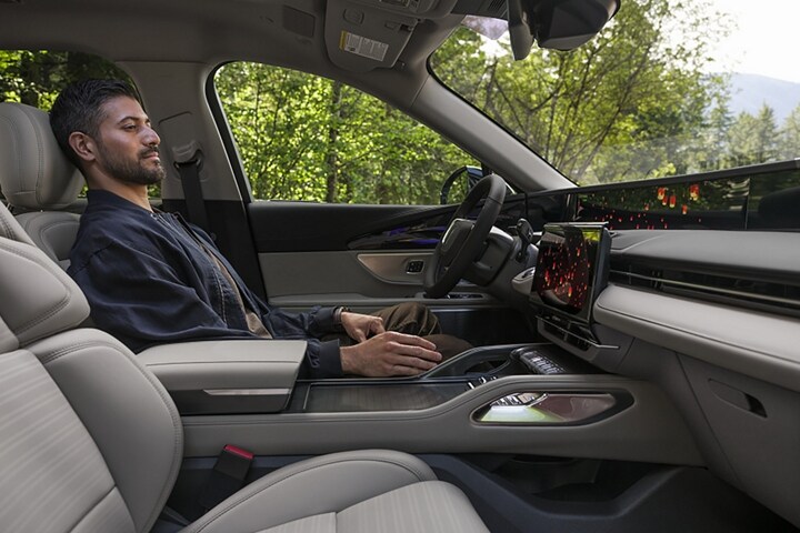 A man enjoys a moment to recharge with the Lincoln Rejuvenate experience