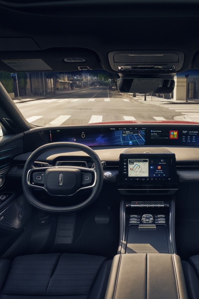 The 2025 Lincoln Nautilus® driving down a road in the desert