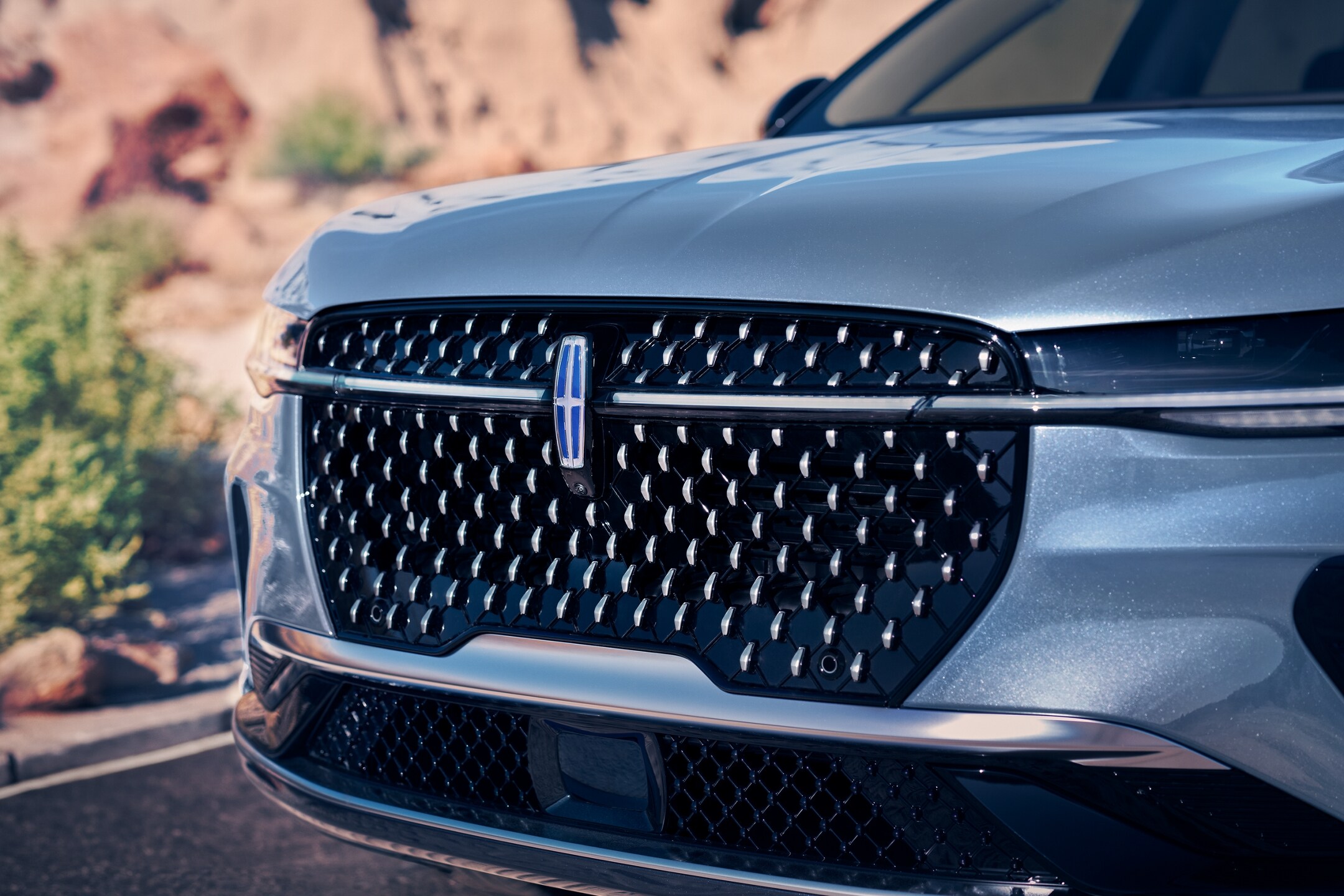 The grille of a 2026 Lincoln Nautilus® SUV with the available Jet Appearance Package