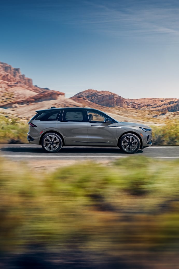 A 2026 Lincoln Nautilus® SUV is being driven on a mountain roadway