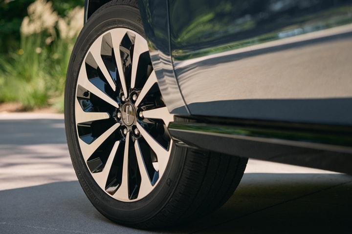 A detail shot of the 22-inch 12-spoke bright-machined aluminum wheels.