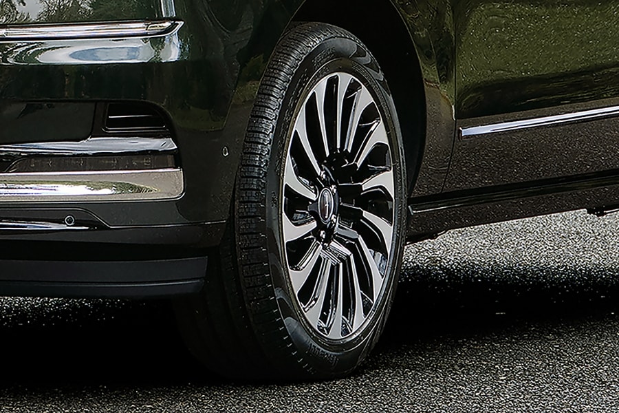 The wheels of a Navigator Black Label vehicle.