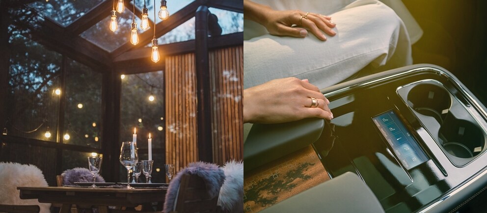 A beautiful set dining table and a woman's hand on the console inside a Navigator black label vehicle.