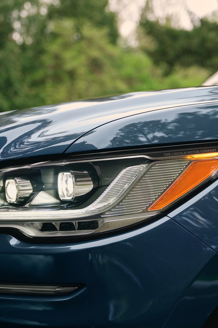 The LED headlamps on a 2024 Lincoln Black Label Navigator® SUV show dynamic lines and bold form