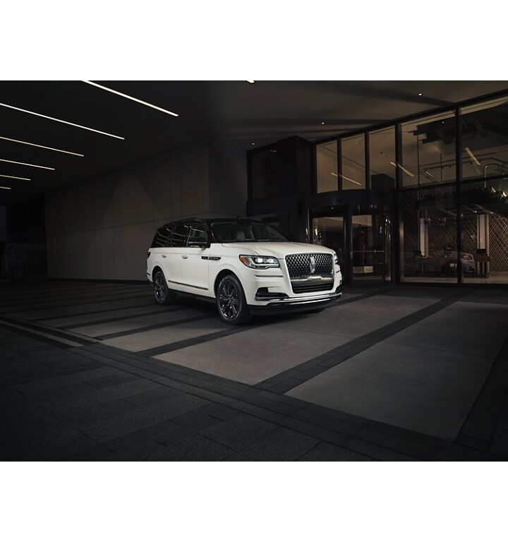 A 2024 Lincoln Black Label Special Edition Package model parked outside of a luxury and shows off bold, contrasting design.
