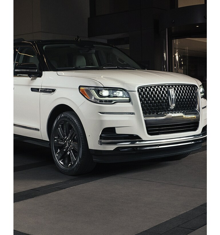 A 2024 Lincoln Black Label Special Edition Package model parked outside of a luxury and shows off bold, contrasting design