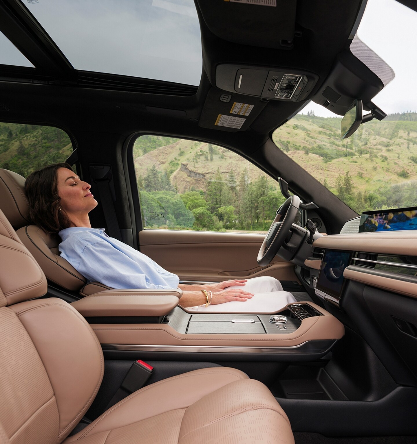 A woman enjoys a moment to recharge with the Lincoln Rejuvenate experience