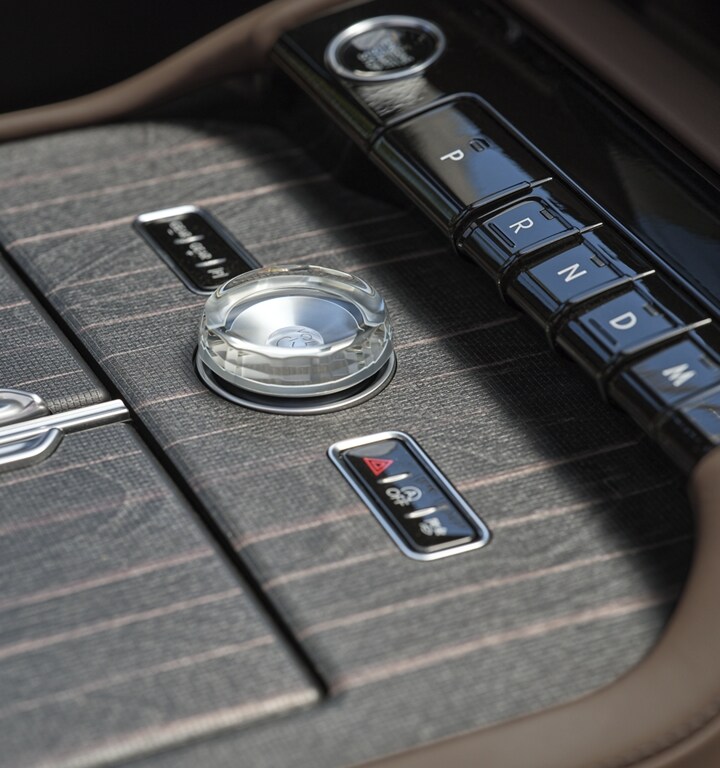 Real wood appliqués of the center console of 2025 Lincoln Black Label Navigator® SUV