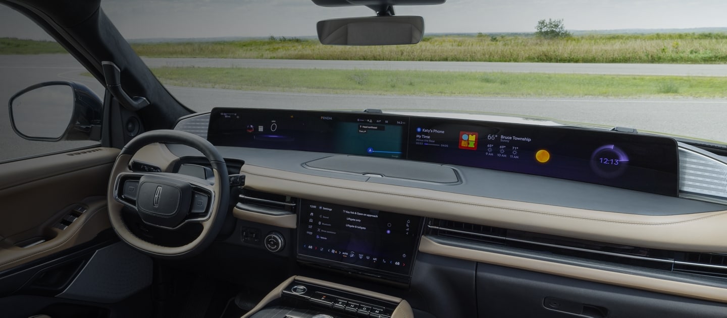El interior de una SUV Lincoln Black Label Navigator® 2025 con el tema Enlighten