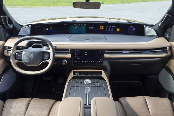 The interior of a 2025 Lincoln Black Label Navigator® SUV plays host to a dramatic panoramic display