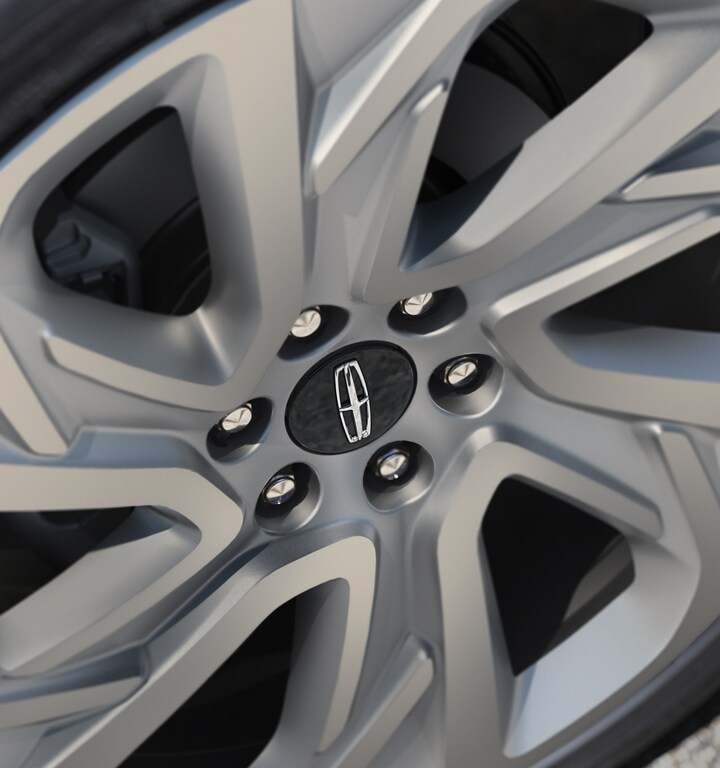 The available 24-inch Luster Nickel wheel on a 2025 Lincoln Black Label Navigator® SUV
