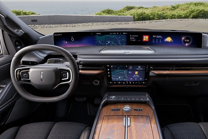 The front cabin of a 2025 Lincoln Black Label Navigator® SUV in the Invitation theme