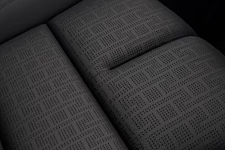 A repeating pattern in the leather seating surface of the Invitation theme represents a pergola