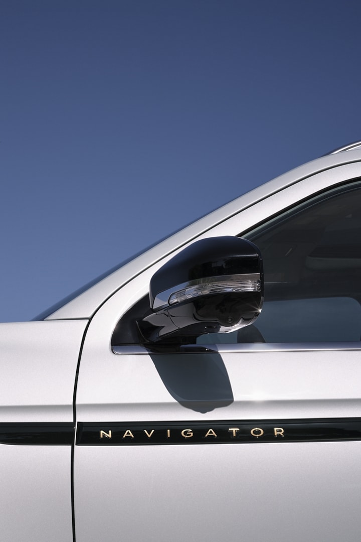 The exterior badging of a 2025 Lincoln Navigator® SUV with the Atmospheric theme