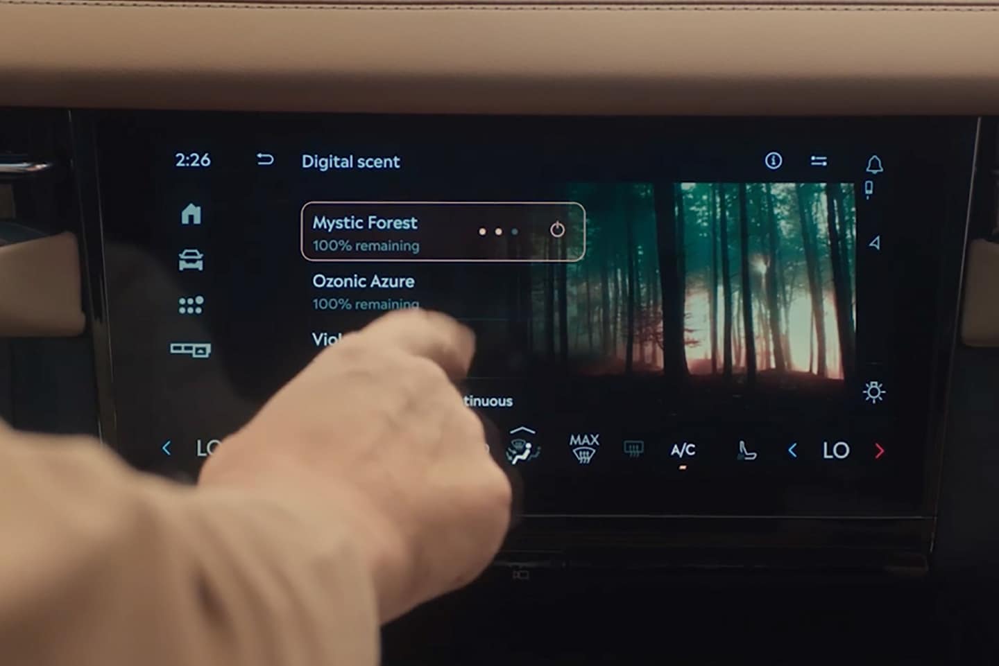 A person uses the Center touchscreen to select a Digital Scent