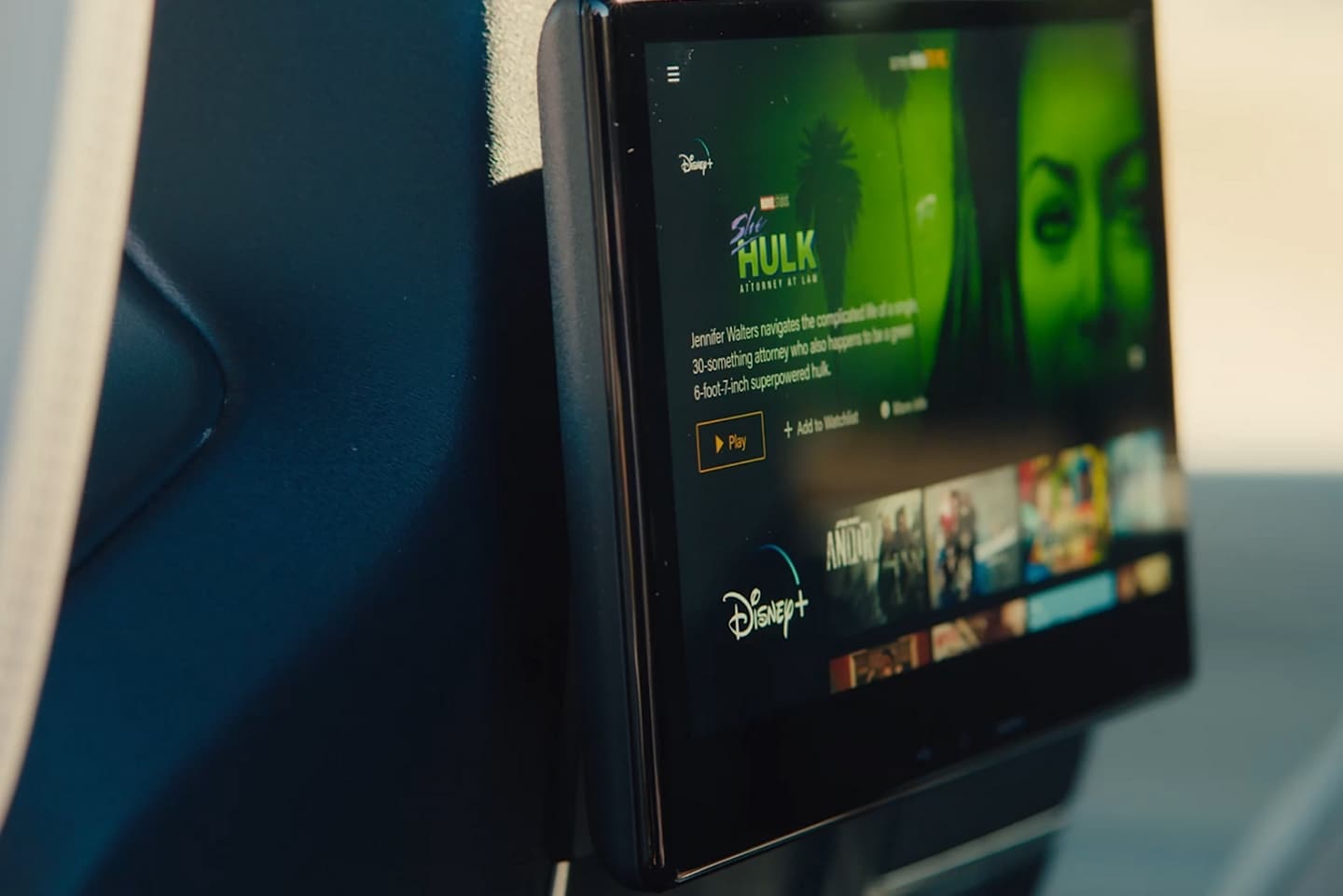 A screen attached to the back of the front-row seats streams video content